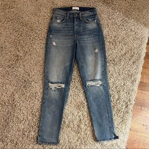 Boyish light wash distressed high waisted jeans with split hem
